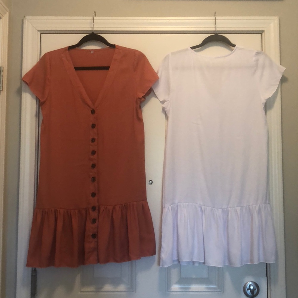 Two dresses, white and a orange rose color
